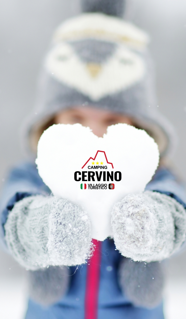 Bambino con cuore di neve, Camping Cervino Villaggio Turistico.